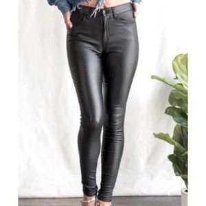 Like new Sneak Peek black coated jeans